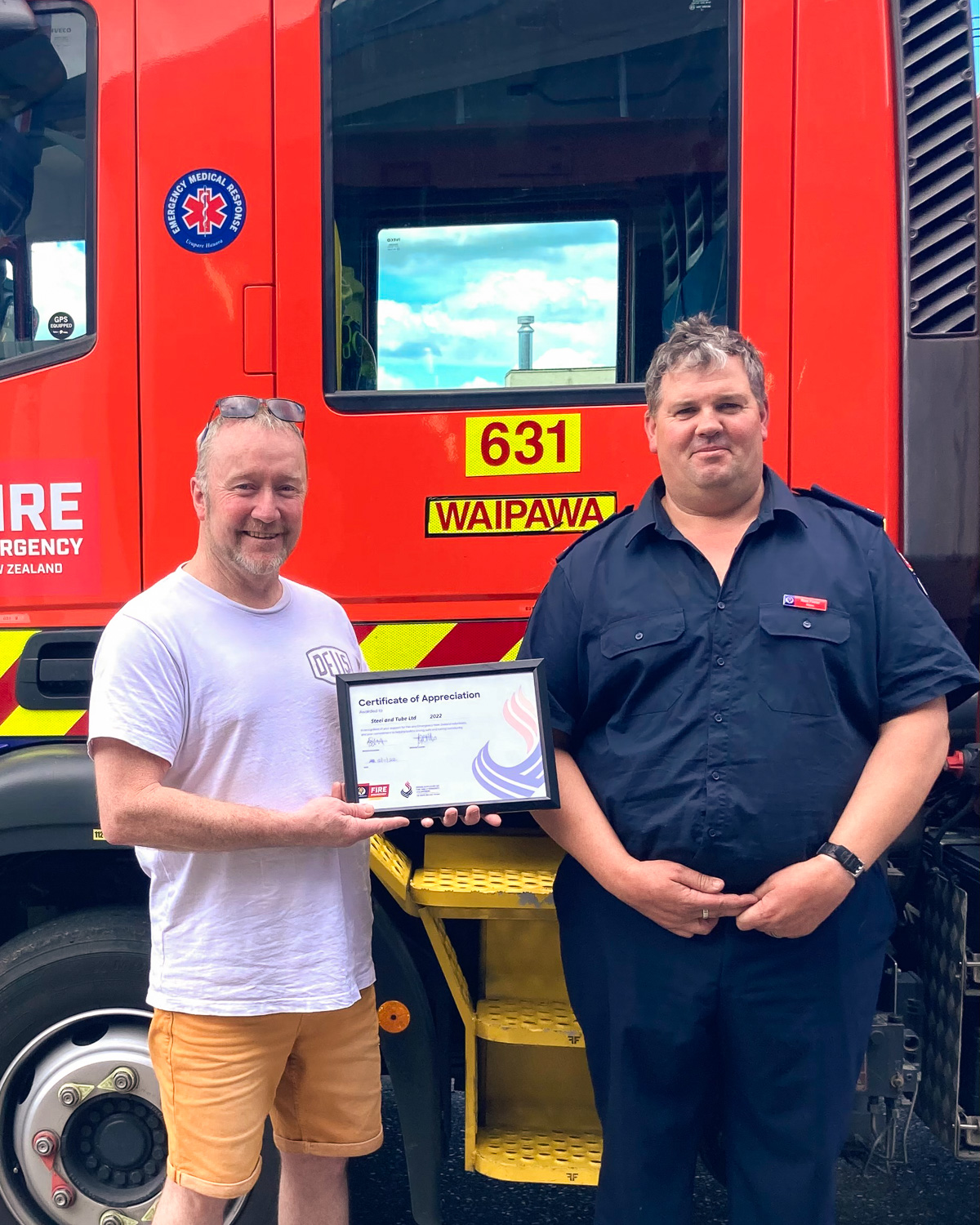Jon-Paul (Left) and Ross Fraser (Right) receiving Volunteer support award